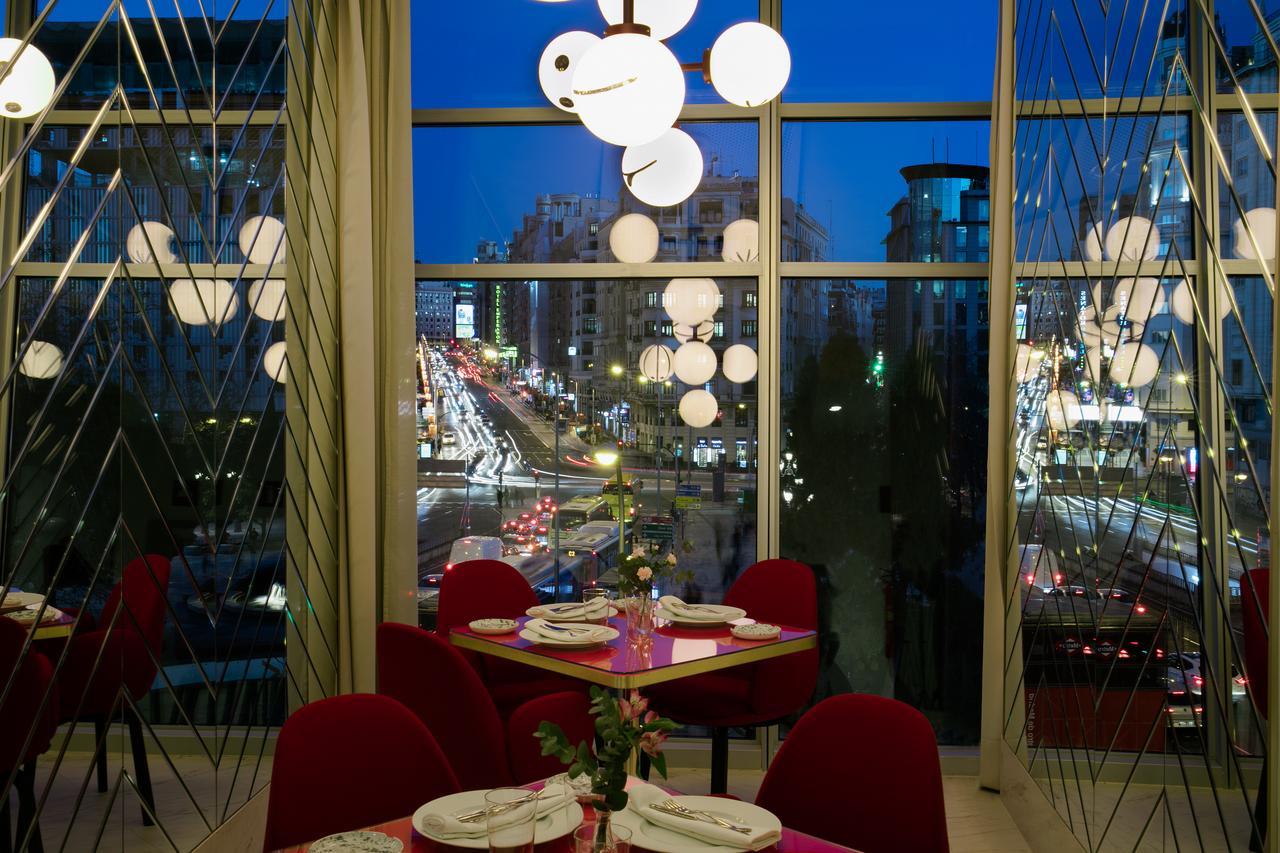 Hotel Barcelo Torre De Madrid Esterno foto Restaurant