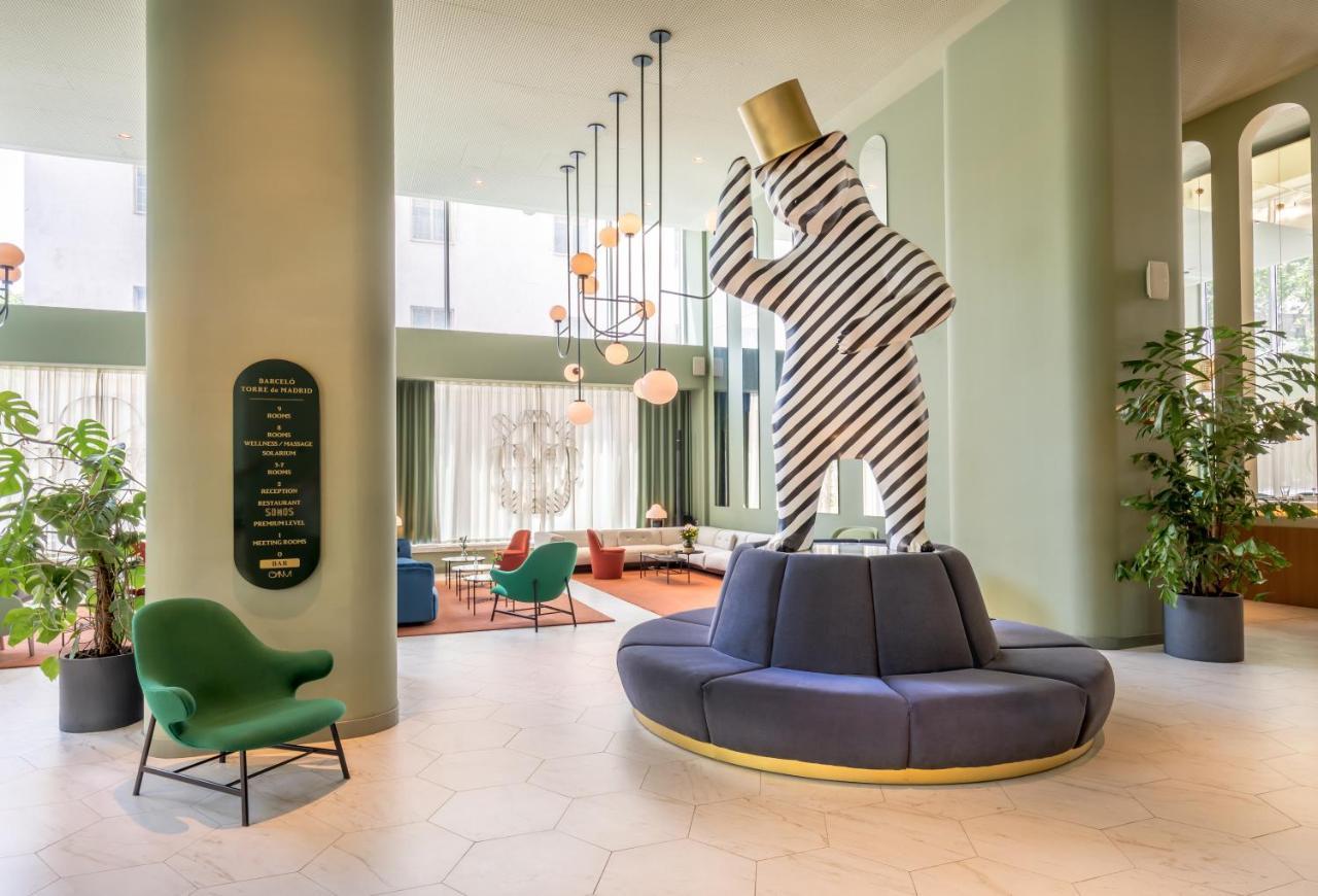 Hotel Barcelo Torre De Madrid Esterno foto Lobby of the hotel